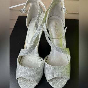 Silver open toed shoes